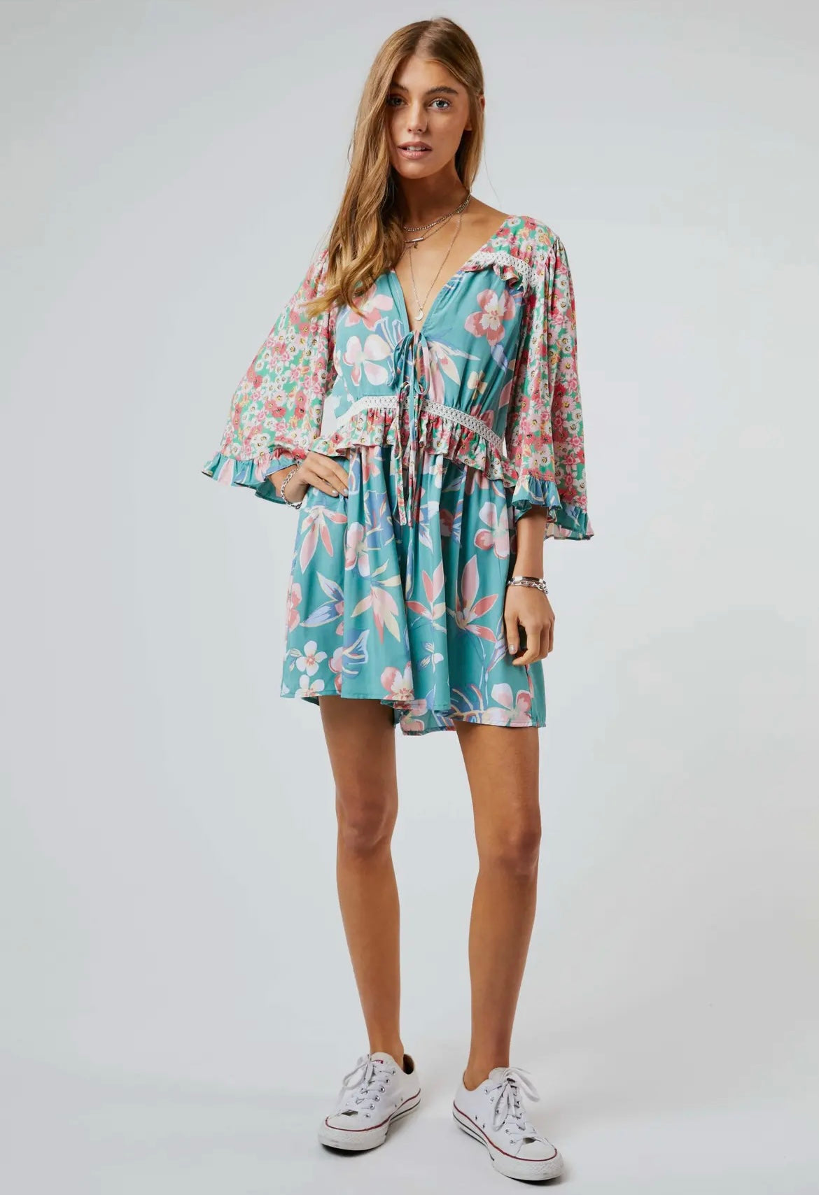 teal floral flare-sleeve romper