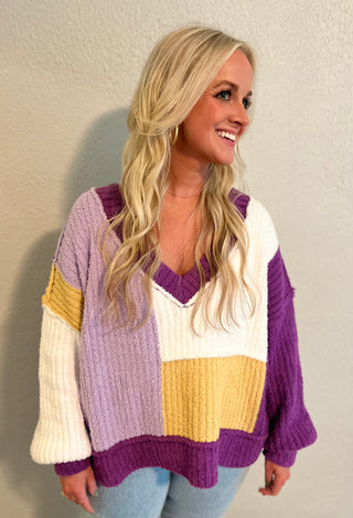 purple & gold sweater