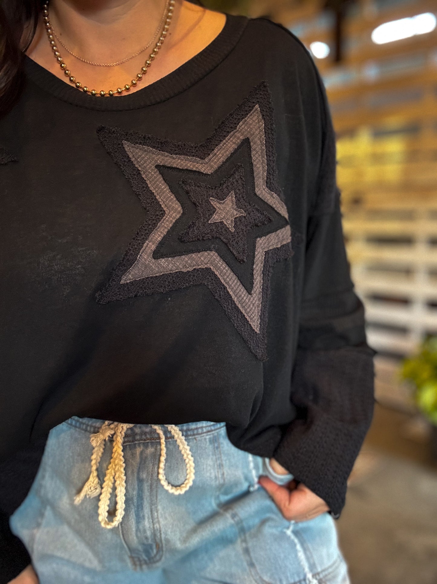 black multi knit star top