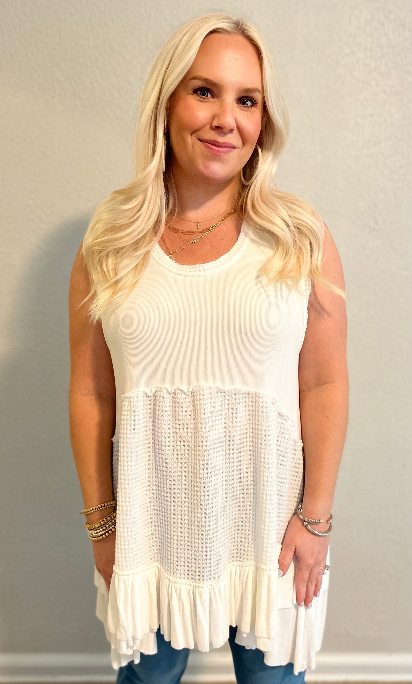 white sleeveless babydoll top