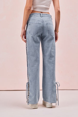 leopard slit bow-tied jeans