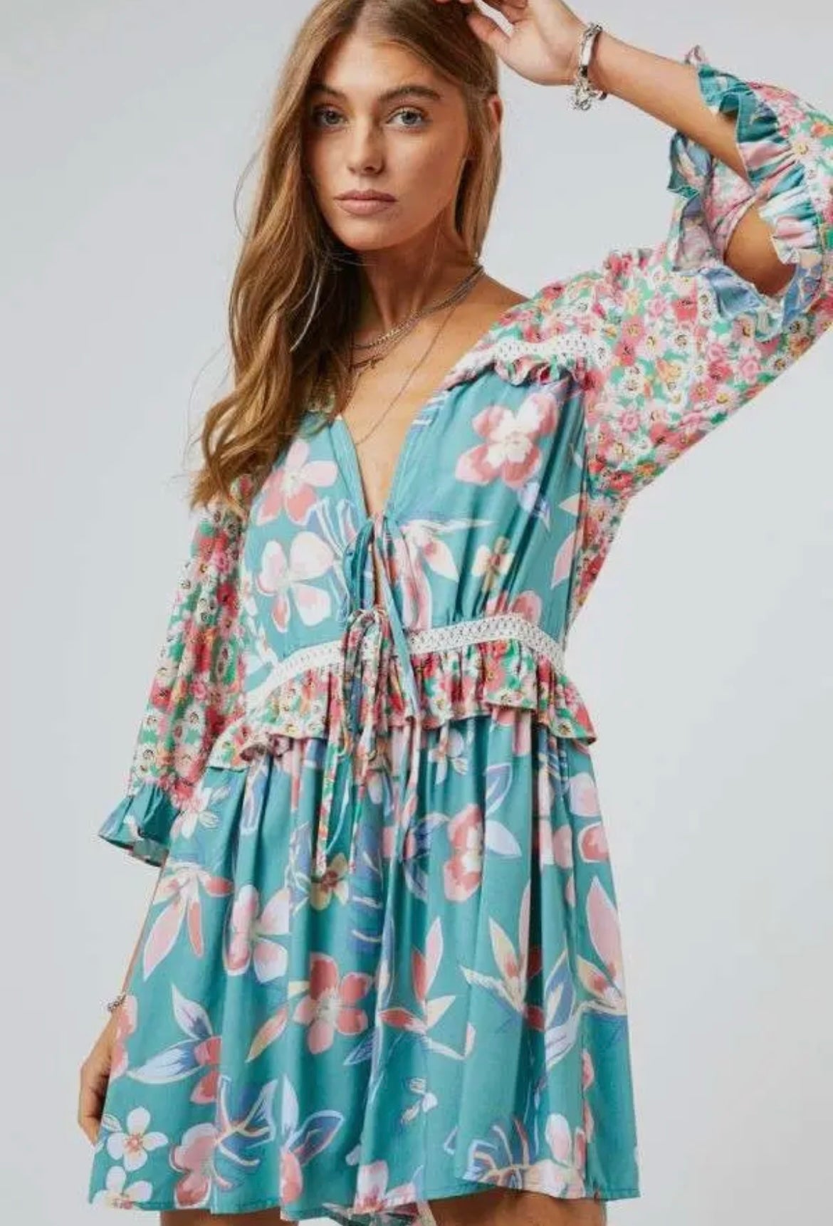 teal floral flare-sleeve romper