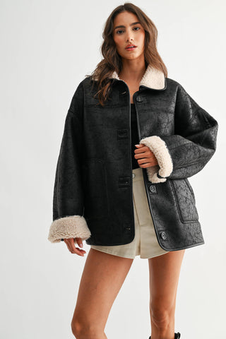 reversible sherpa + leather jacket