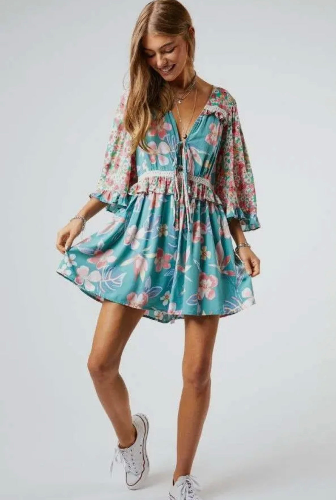 teal floral flare-sleeve romper