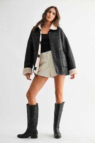 reversible sherpa + leather jacket