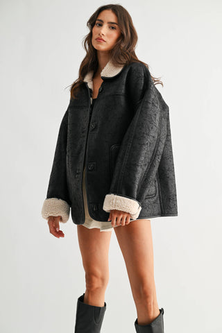 reversible sherpa + leather jacket