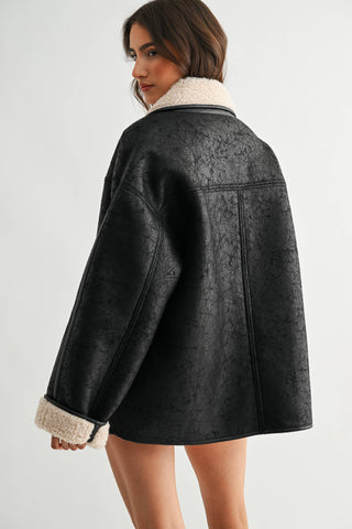 reversible sherpa + leather jacket