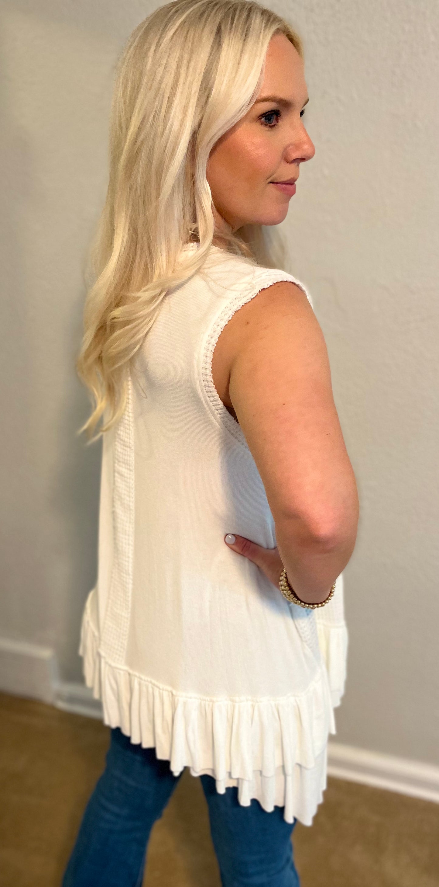 white sleeveless babydoll top