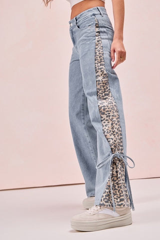 leopard slit bow-tied jeans