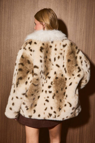 spotted animal print coat