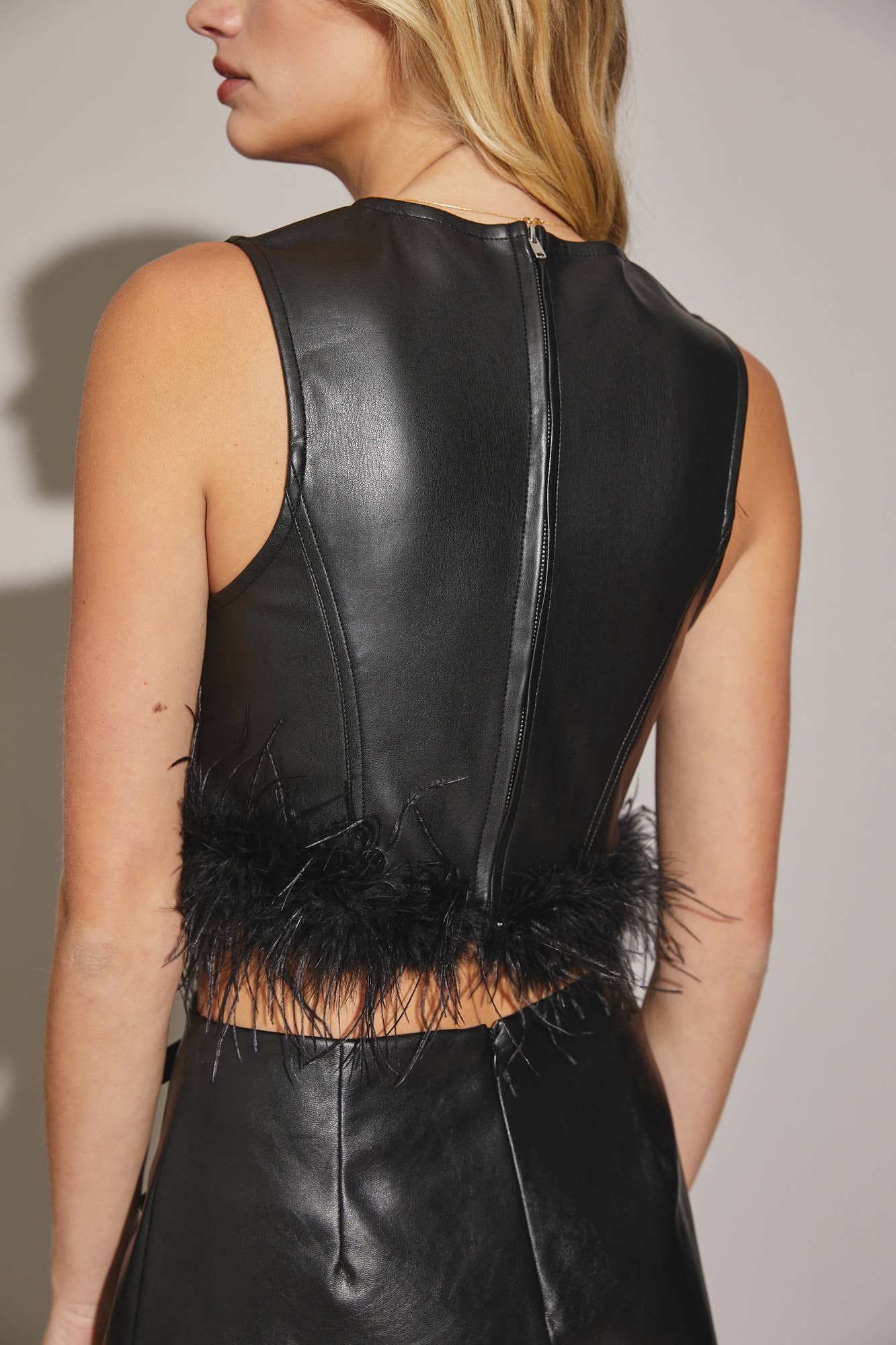 black pleather feather trim top