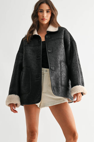reversible sherpa + leather jacket