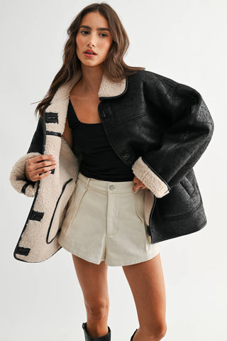 reversible sherpa + leather jacket